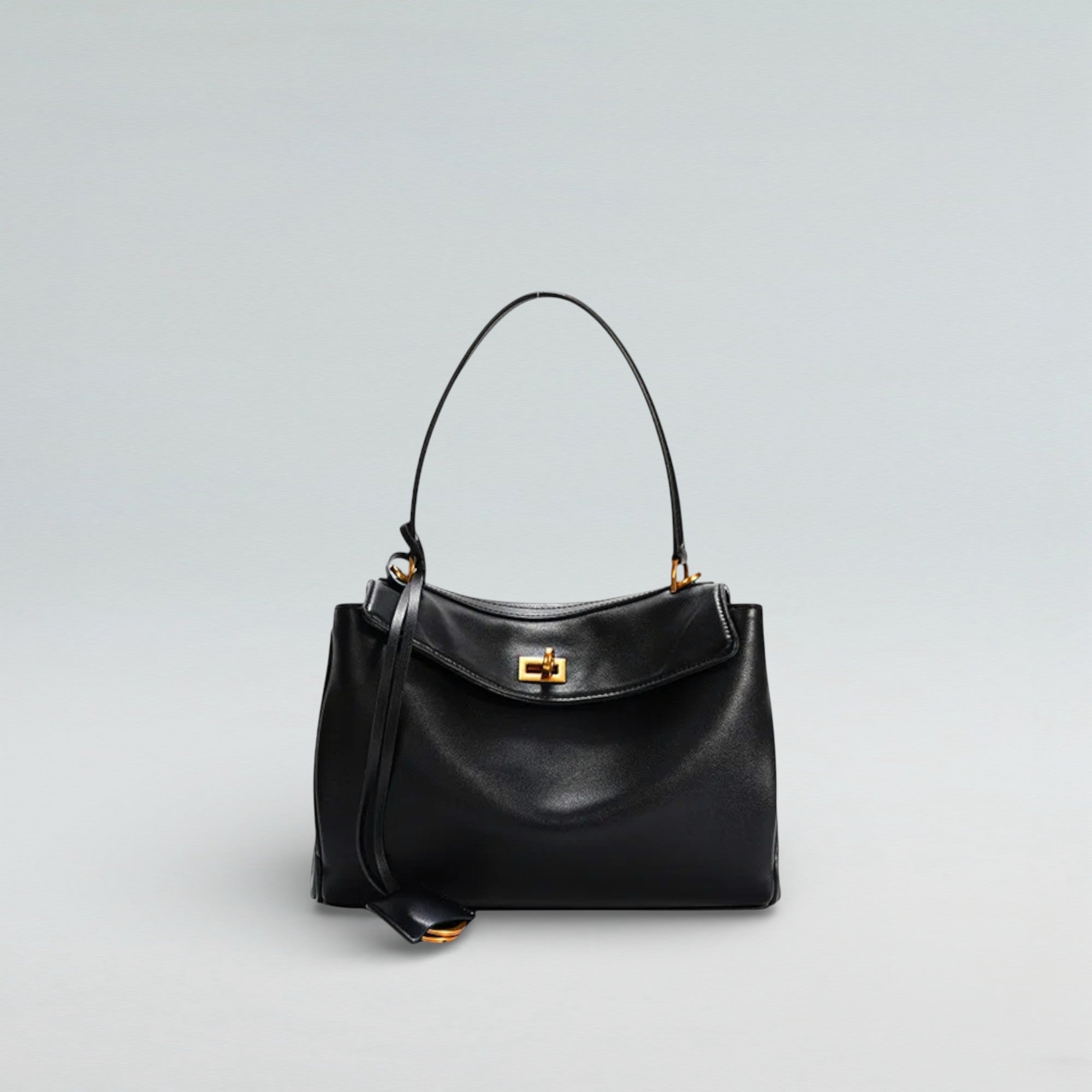 Black leather Louve Locket handbag, a classic shape that shows why the black bag endures