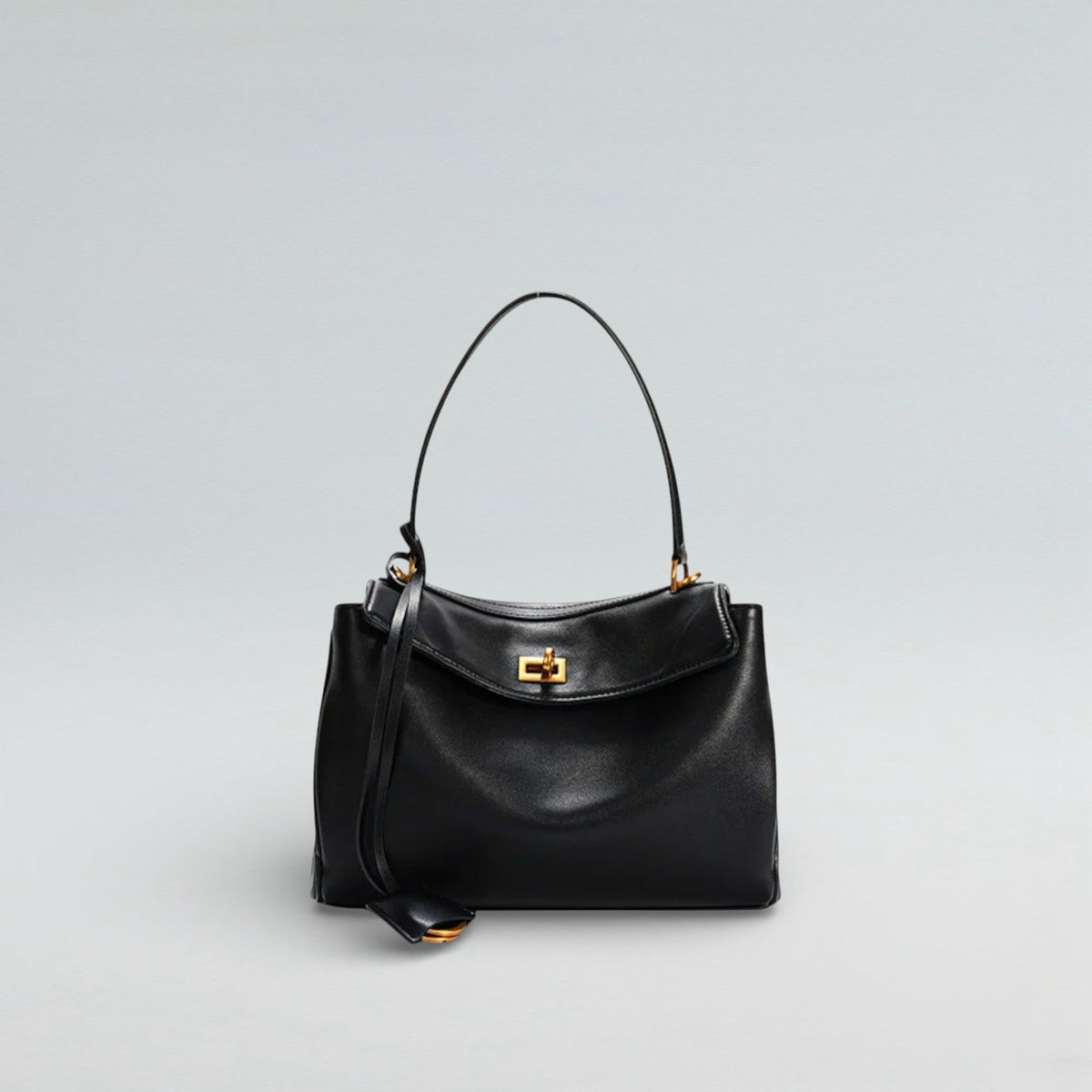 Black leather Louve Locket handbag, a classic shape that shows why the black bag endures