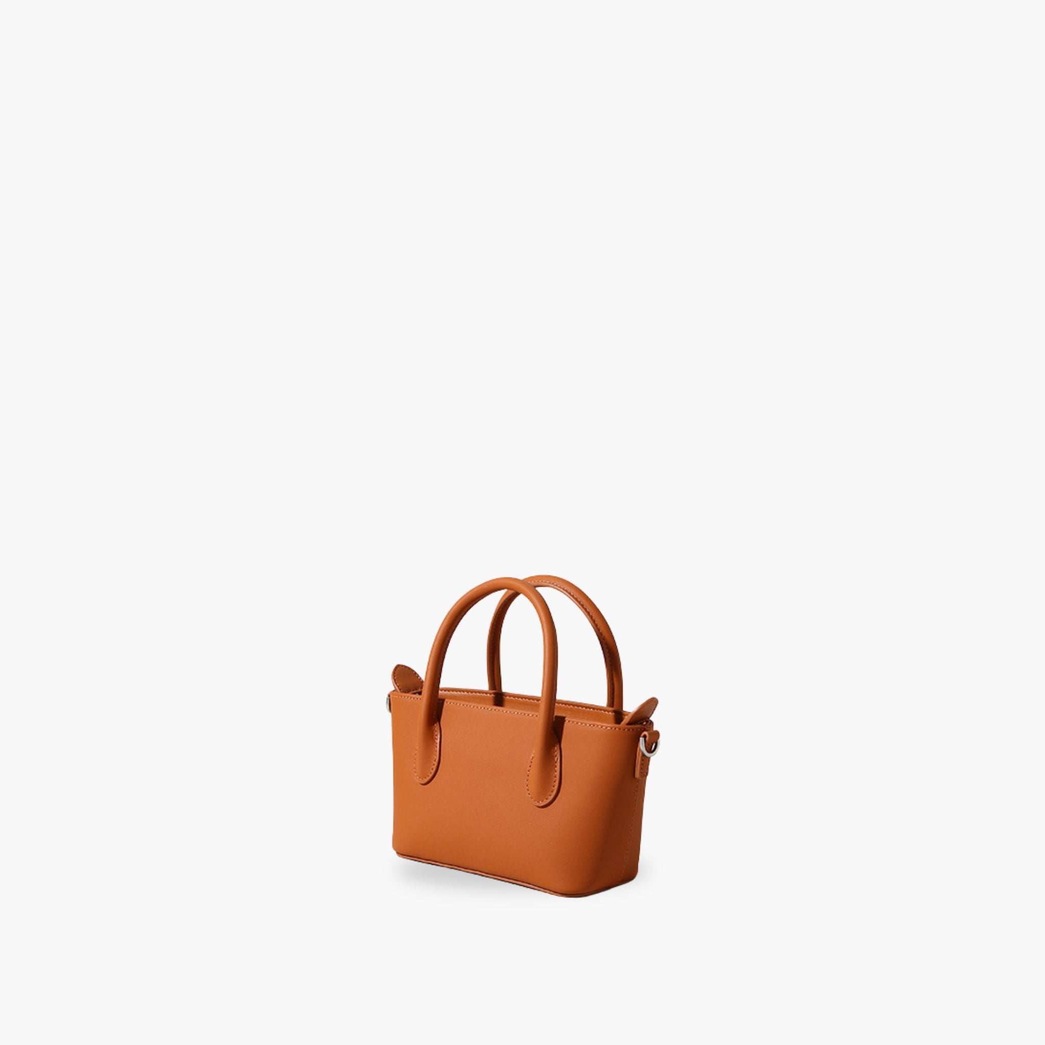 Bagulia Minnie topgrain leather bag in urban chic setting – stylish, sustainable, luxurious design by Bagulia