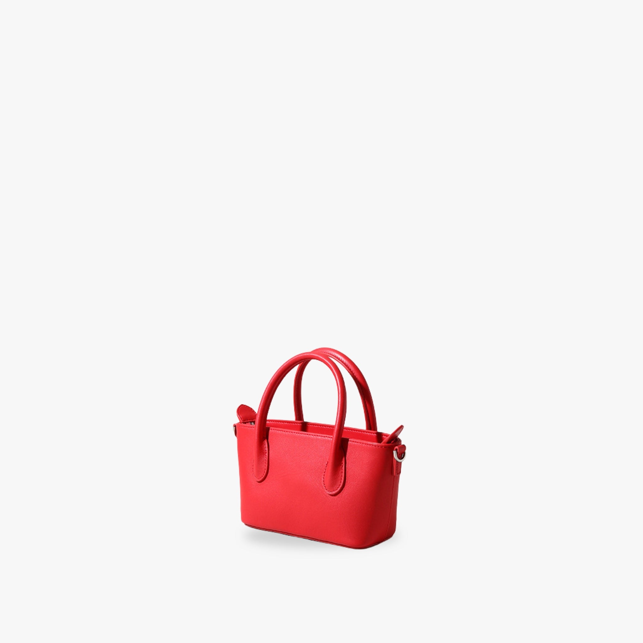 Minnie mini tote bag in red, crafted from full grain leather, a chic and elegant luxury handbag.