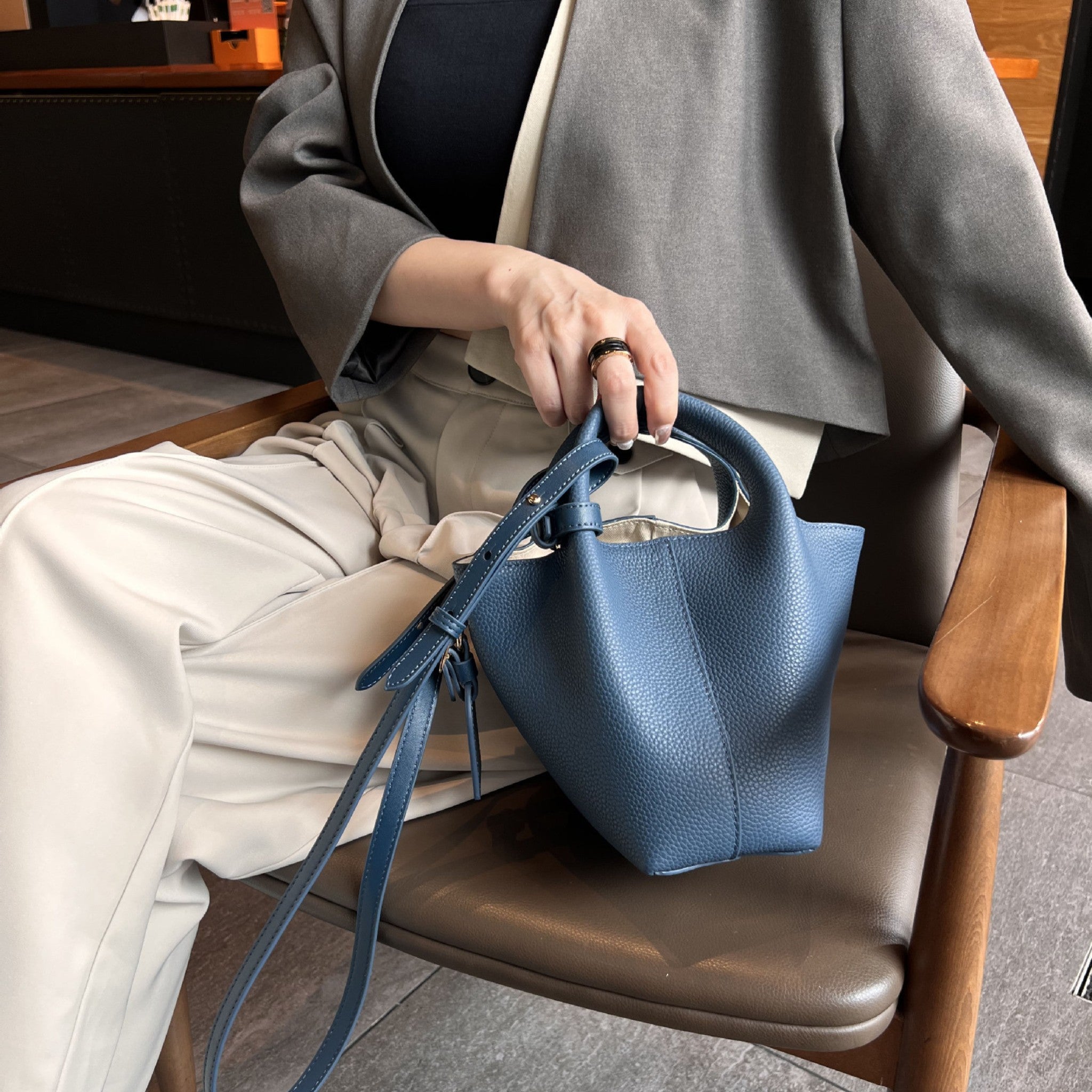 Model-Carrying-Muted-Blue-Lamia-Pebbeled-Top-Grain-Leather-Shoulder-Bag-Bagulia_21.jpg