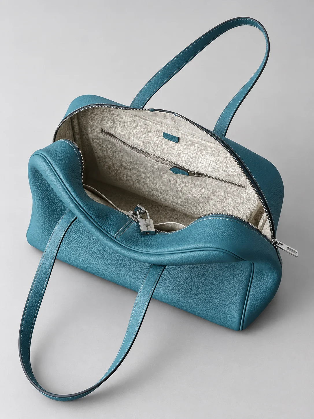 Ballerina leather tote in Dark Cyan, open interior and zipped pocket