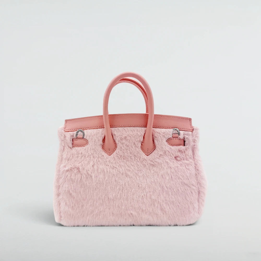 Back view of the Bagulia Birky 25cm Baby Pink faux fur handbag with pink leather handles