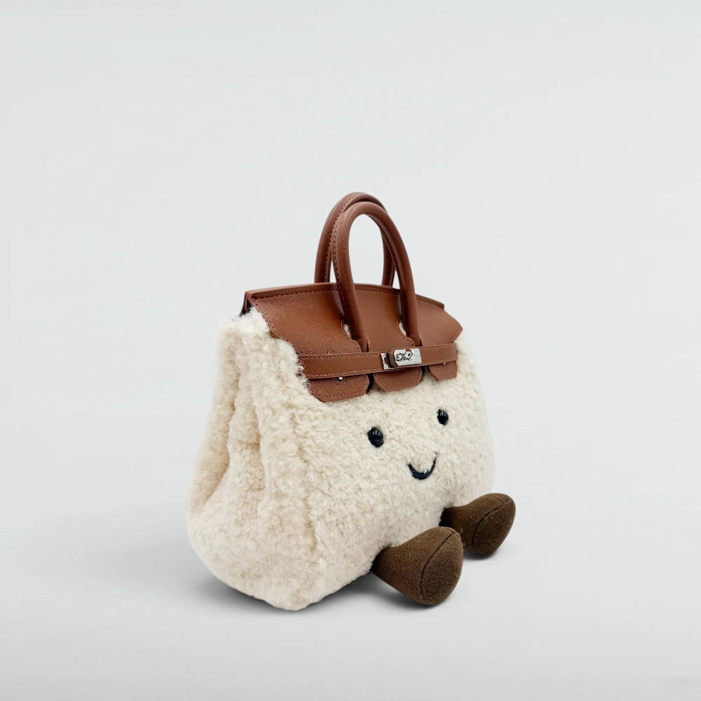 Bagulia Birky Cream plush handbag with brown leather flap and silver lock, three-quarter angle view