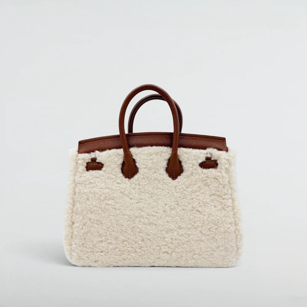 Back view of the Bagulia Birky 25cm Cream teddy fleece handbag with brown leather handles