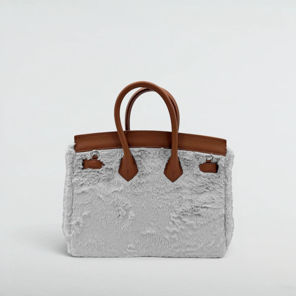Back view of the Bagulia Birky 25cm Grey faux fur handbag with tan leather handles