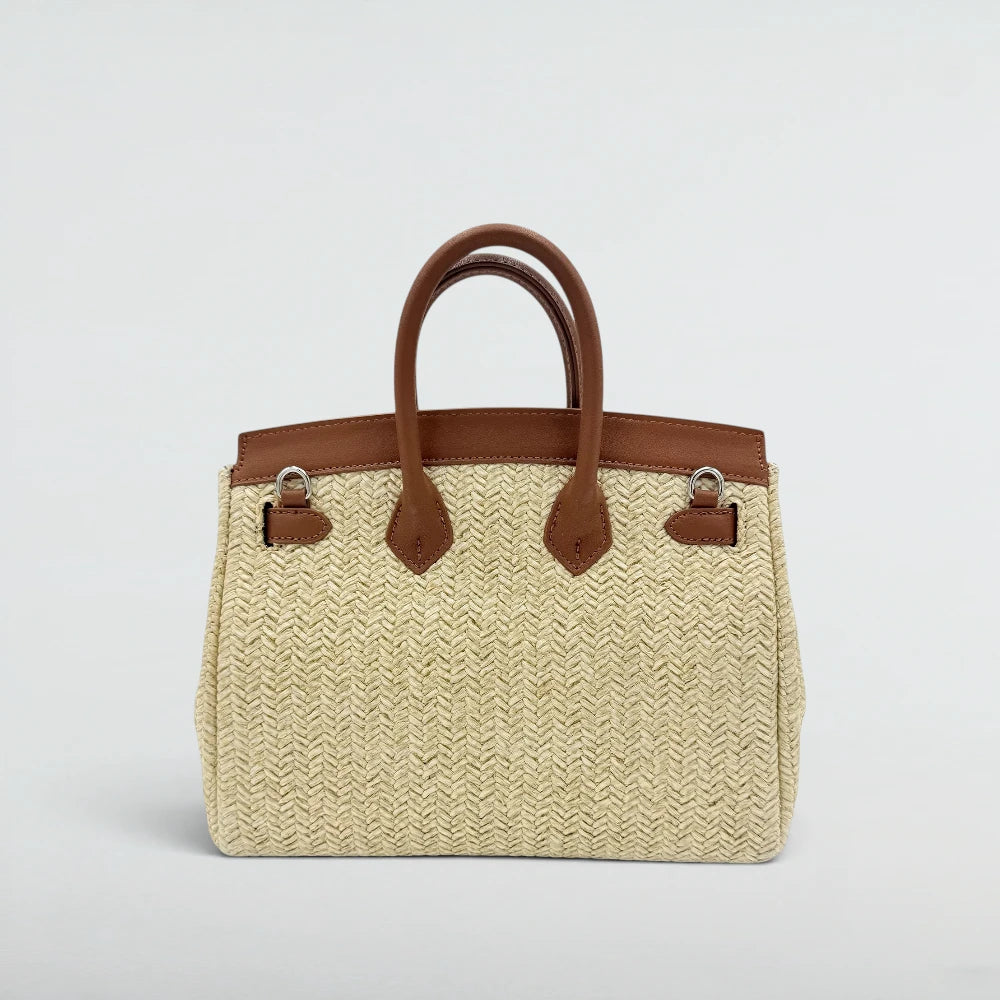 Back view of the Bagulia Birky 25cm woven straw handbag with tan leather handles
