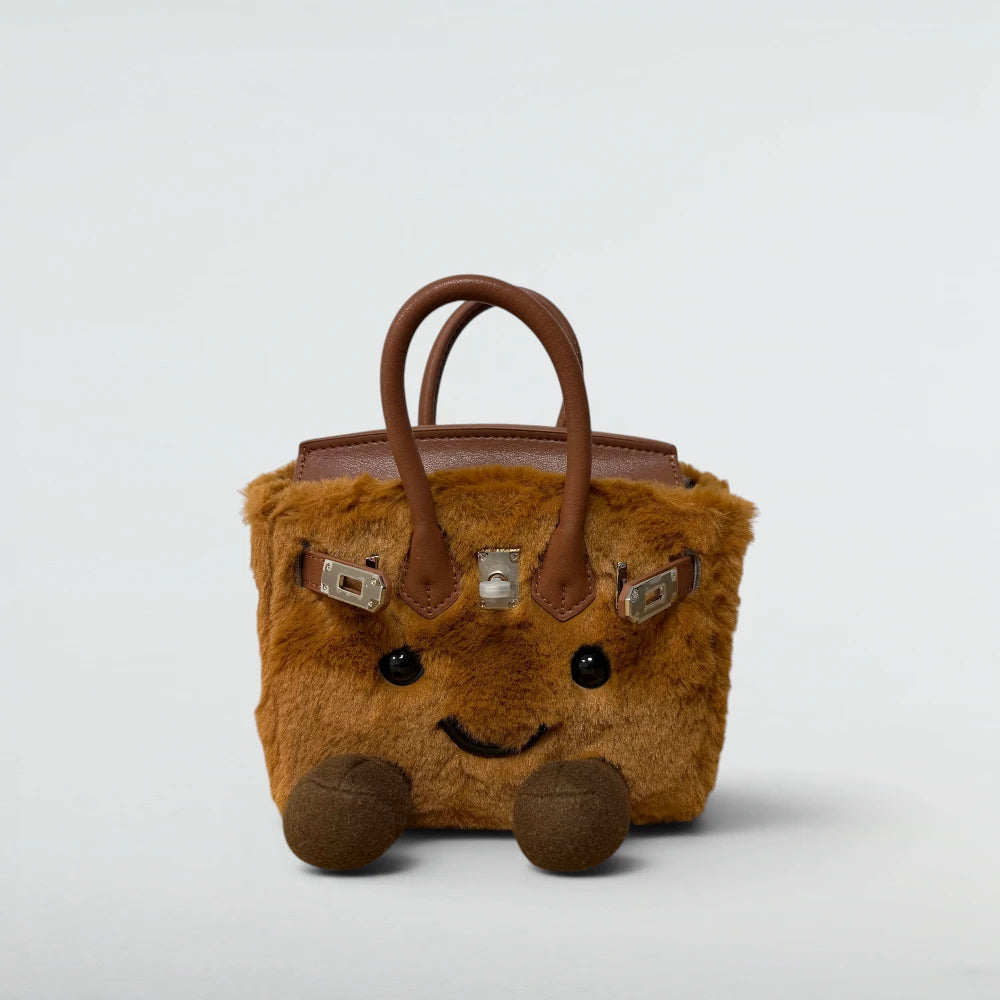 Bagulia Birky 18cm mini plush Birkin-style bag in Caramel ginger faux fur with smiley face, front view