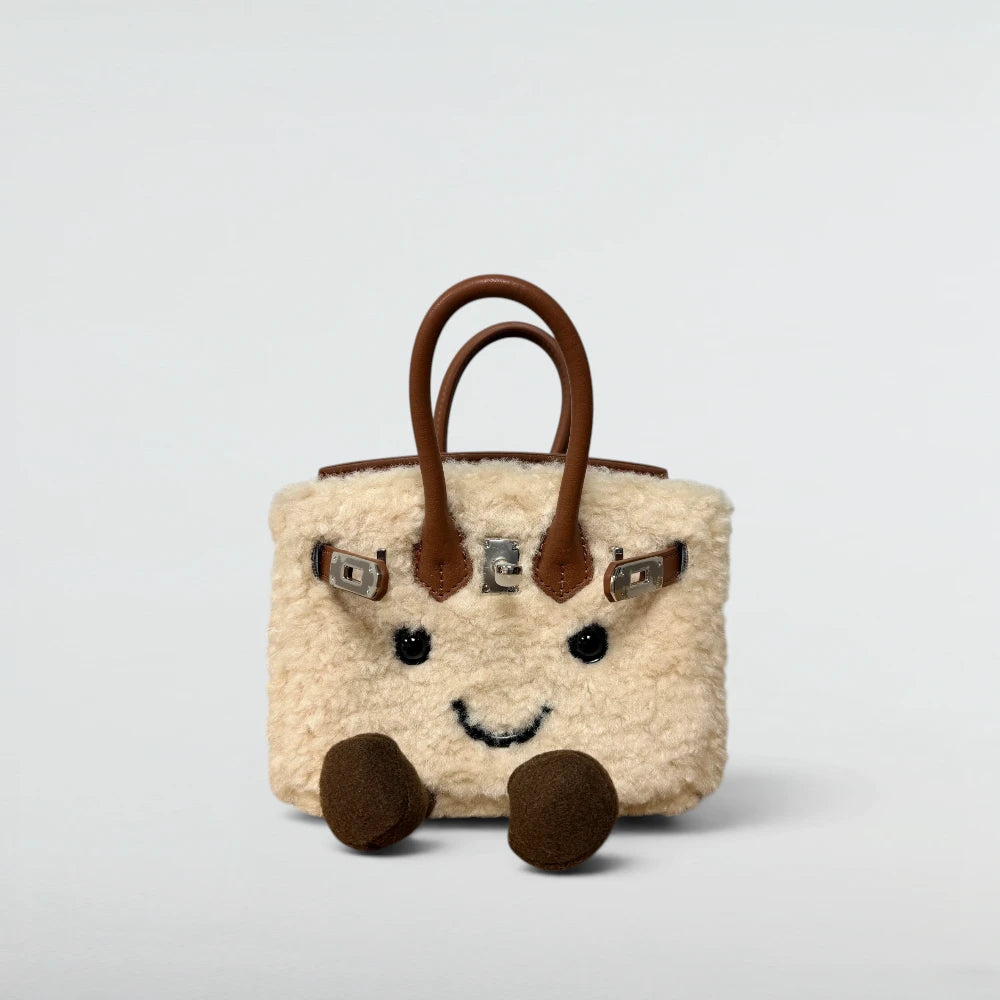 Bagulia Birky 18cm mini sherpa Birkin-style bag in Cream with brown leather handles and smiley face, front view