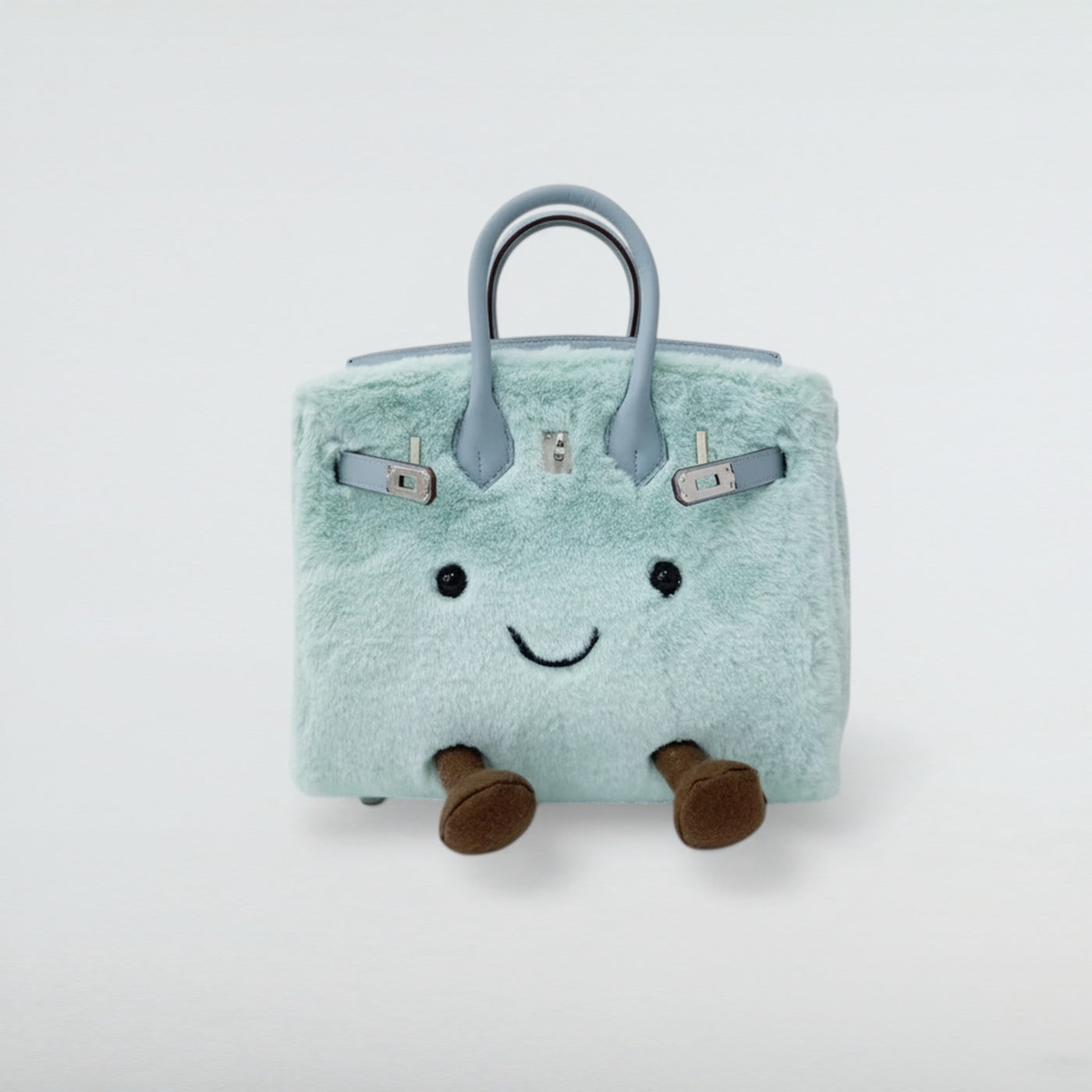 Bagulia Birky 25cm Light Cyan mint plush Birkin-style bag with smiley face and legs, front view
