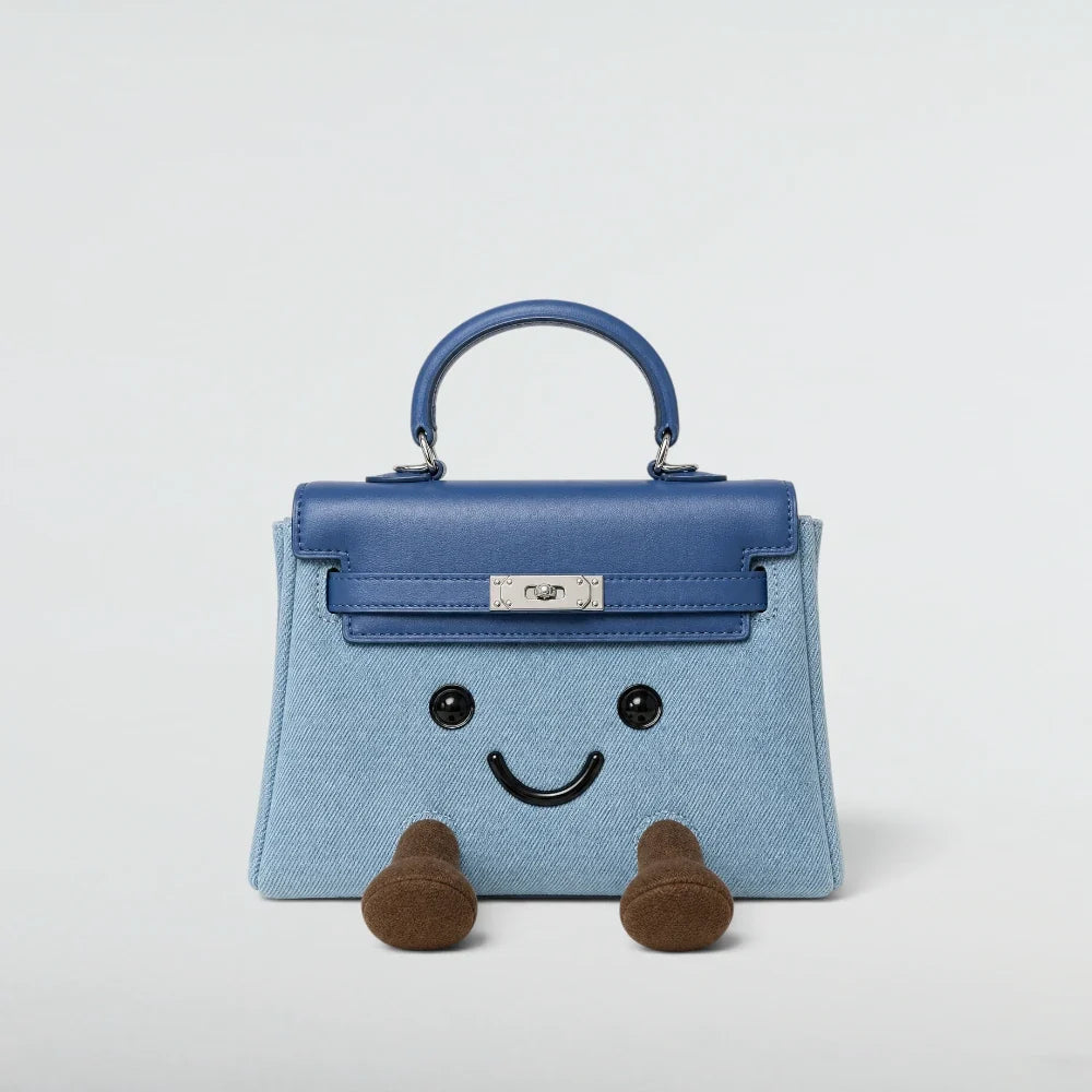 Bagulia Birky Jelly Kelly Denim Blue character handbag with silver-tone hardware front studio view