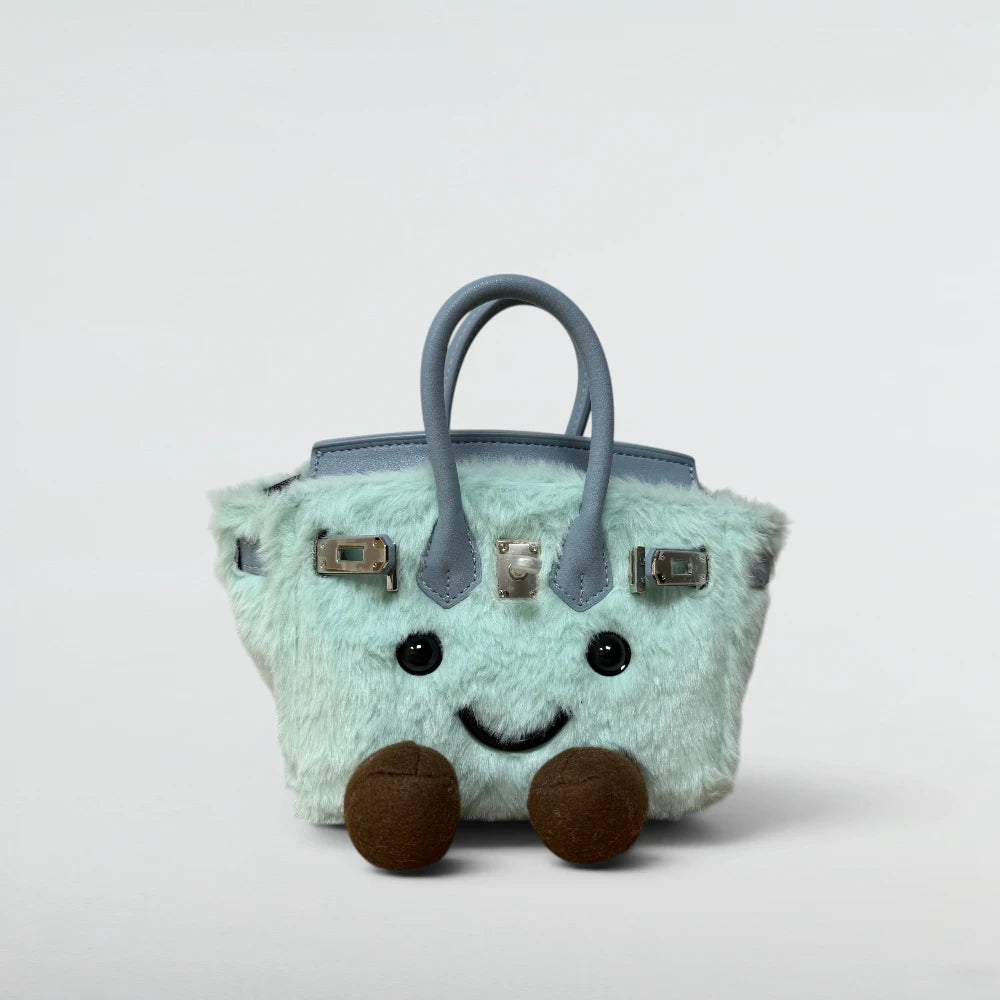 Bagulia Birky 18cm mini plush Birkin-style bag in Light Cyan mint faux fur with smiley face, front view