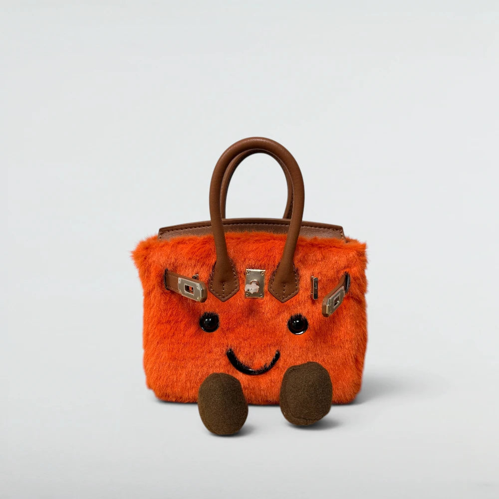 Bagulia Birky 18cm mini plush Birkin-style bag in Orange faux fur with smiley face, front view
