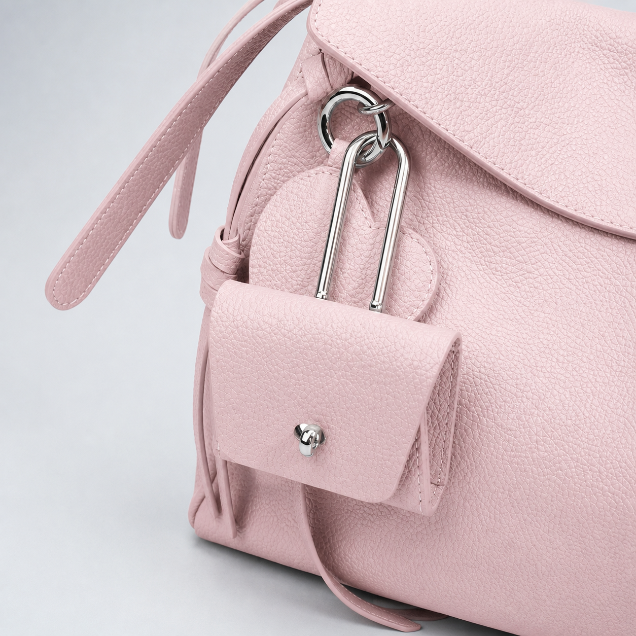 Leyla cream pink pebbled leather, silver-tone hardware and detachable mini pouch detail