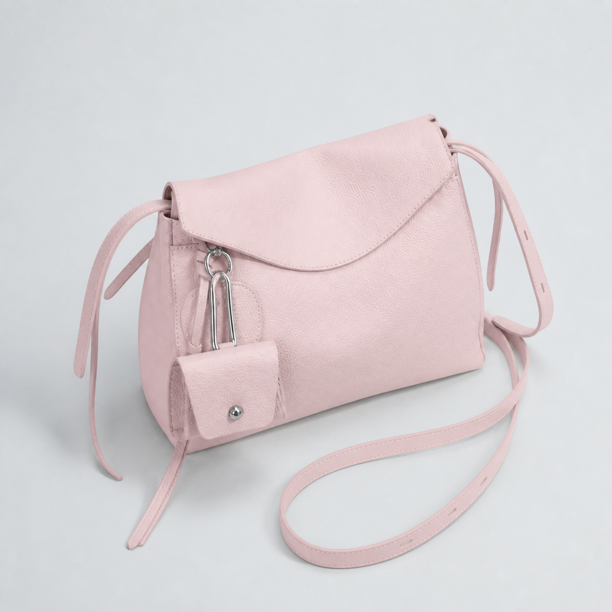 Leyla cream pink pebbled leather shoulder bag, closed top-down studio view