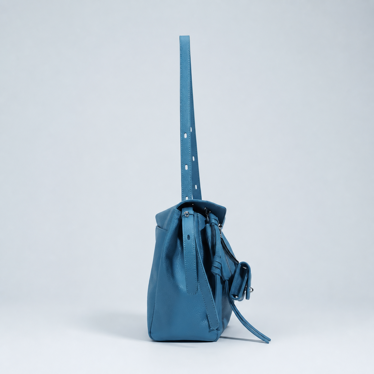 Leyla diamond blue pebbled leather shoulder bag, side profile studio view