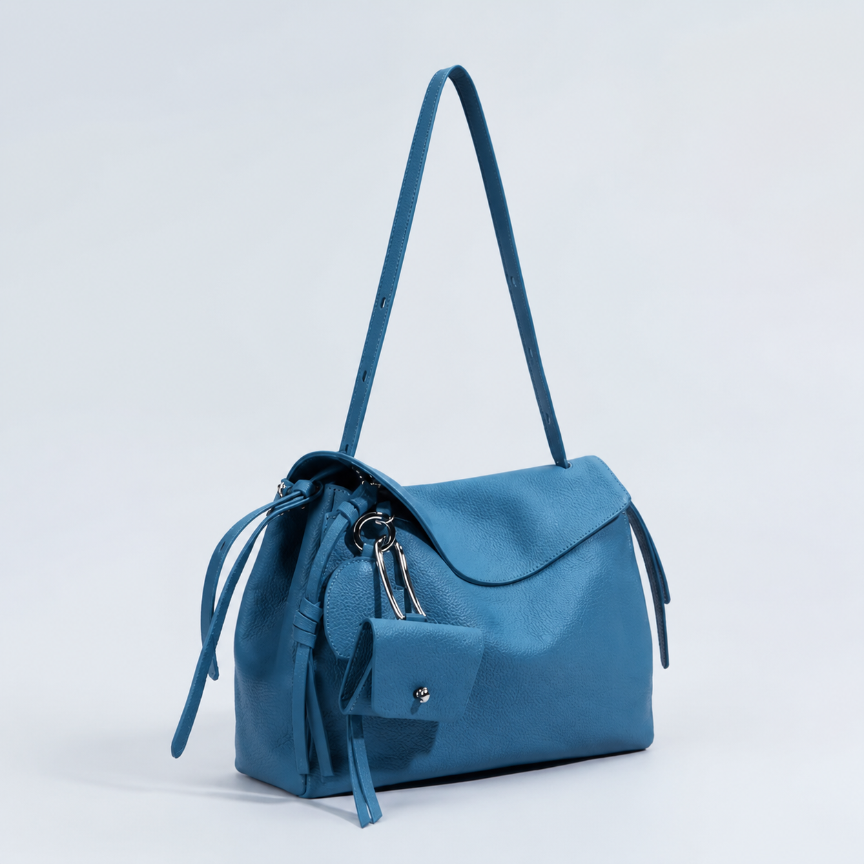 Leyla diamond blue pebbled leather shoulder bag, three-quarter studio view