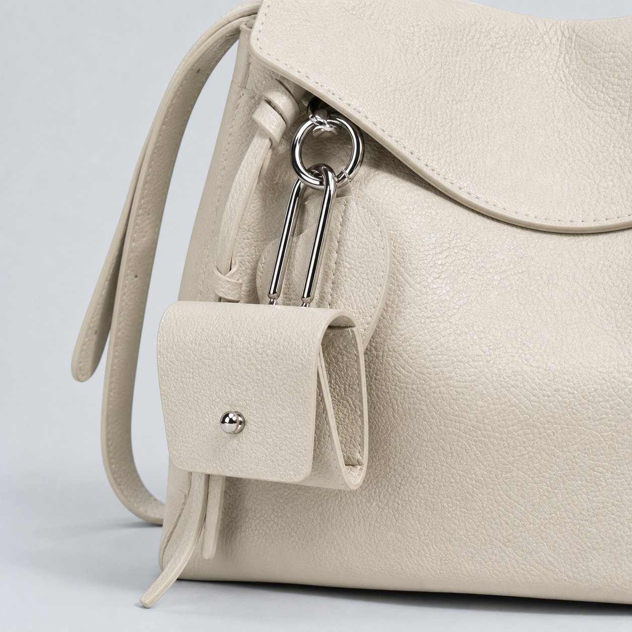 Leyla off-white pebbled leather, silver-tone hardware and detachable mini pouch detail