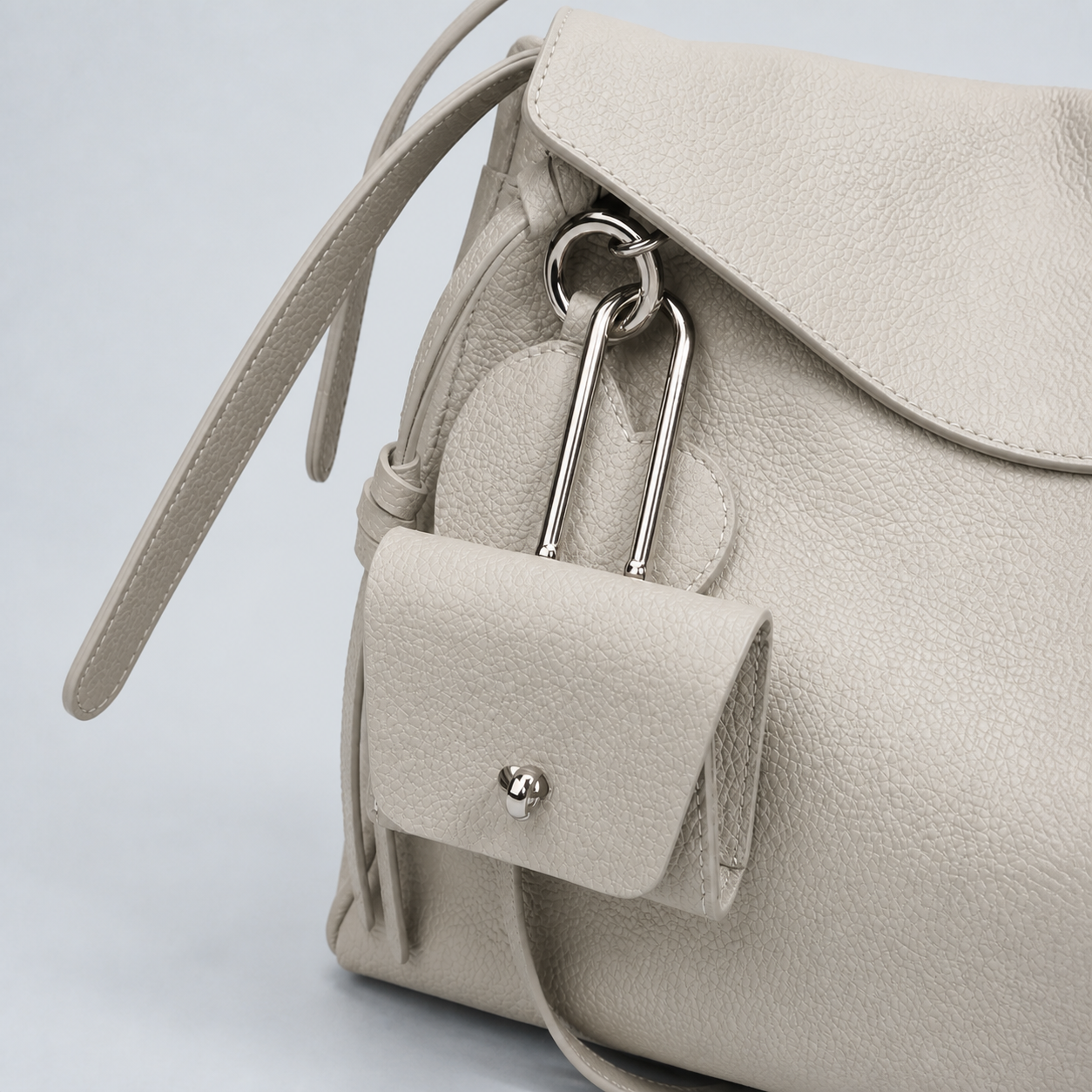 Leyla pearl grey pebbled leather, silver-tone hardware and detachable mini pouch detail