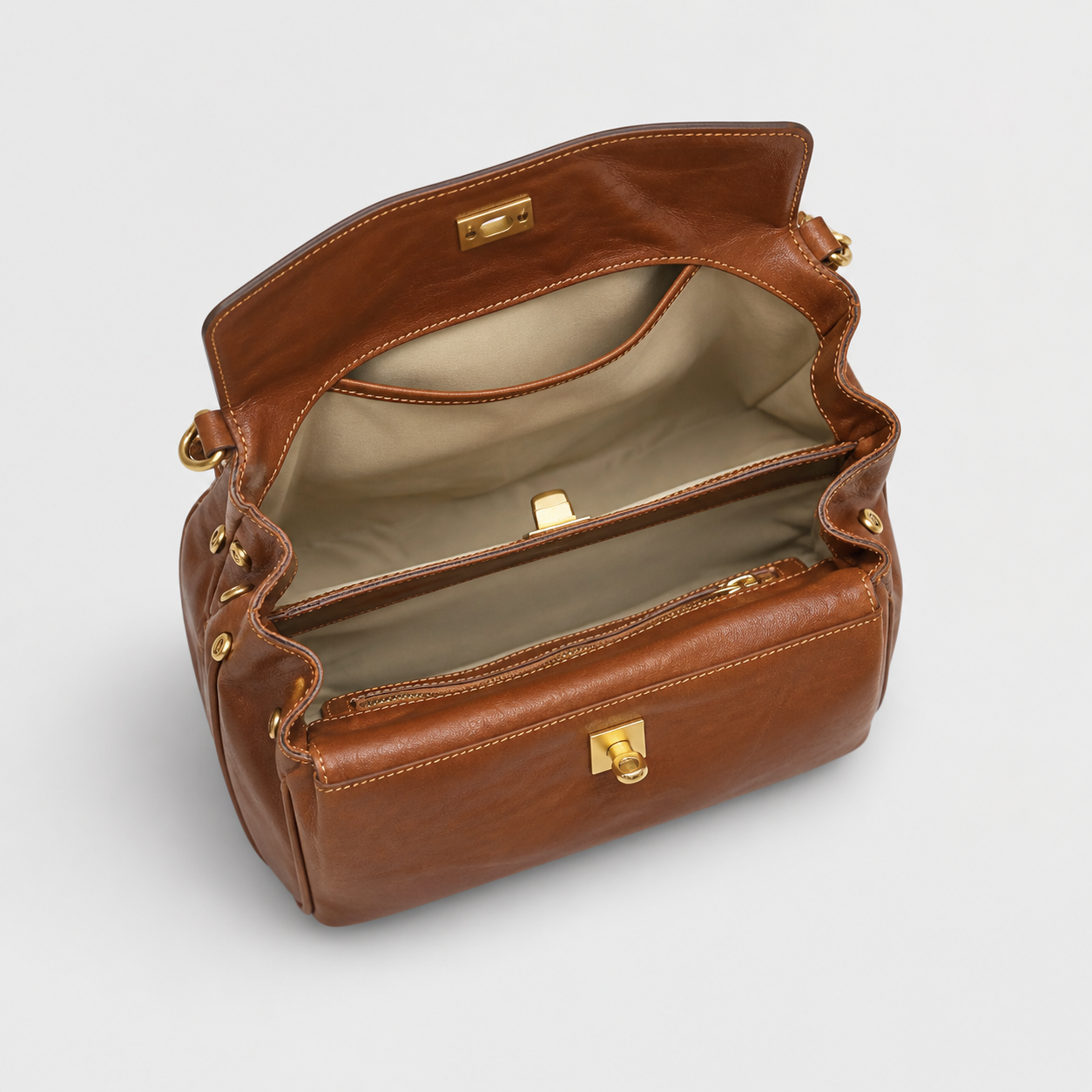Bagulia Louve Locket Patina Bag with beige two-compartment interior