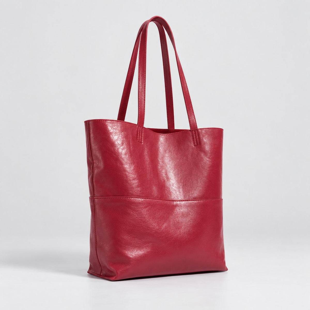 Bagulia Marielle Cherry Red tote three quarter view.