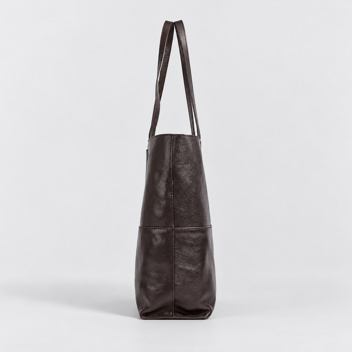 Bagulia Marielle Dark Brown tote side profile view.
