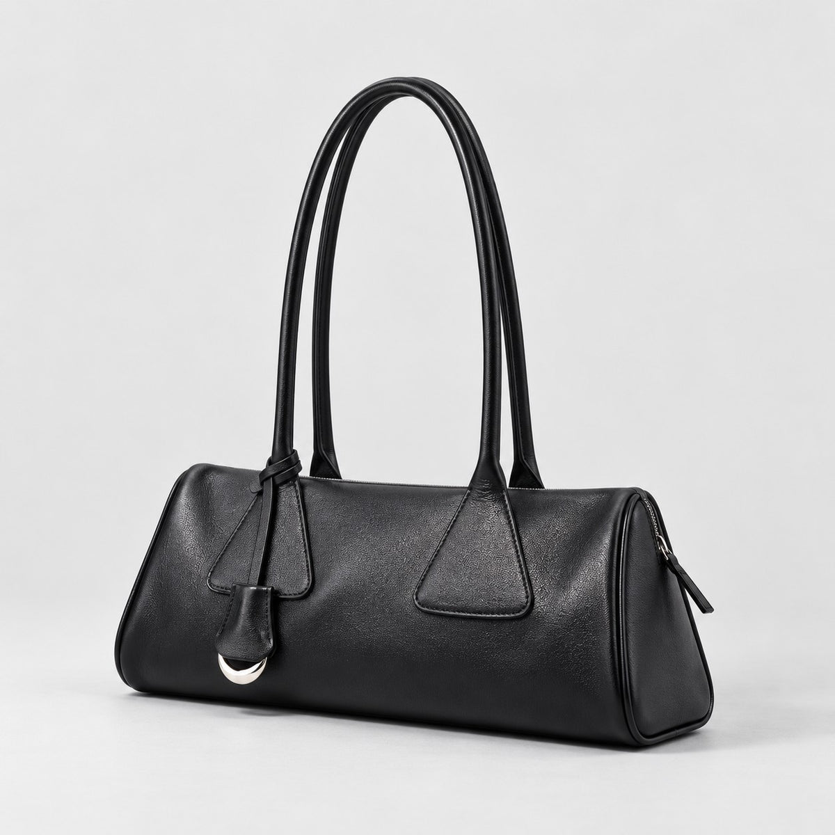 Bagulia Vera shoulder bag in black shown in three quarter view.