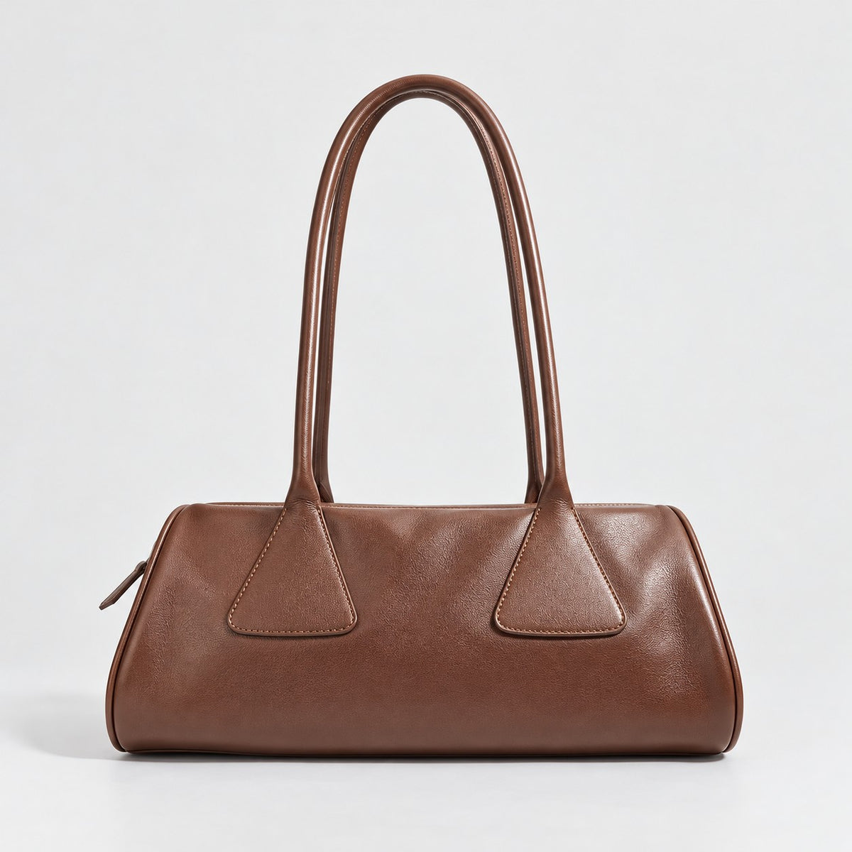 Bagulia Vera shoulder bag in brown shown in back view.