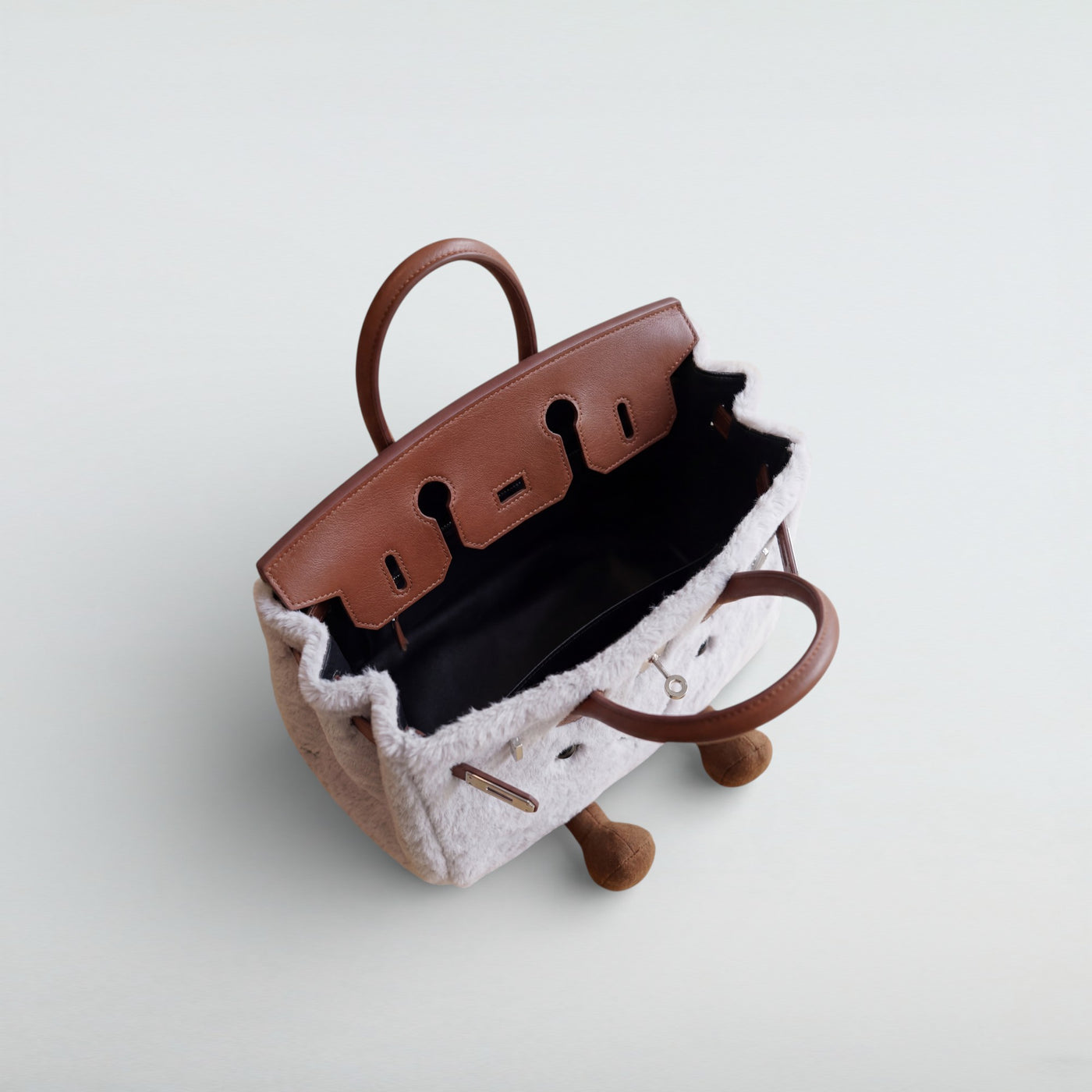 Inside view of the Bagulia Birky Grey plush bag showing the lining
